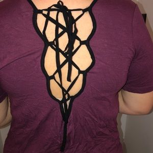 Maroon / burgundy. T-shirt with accent cross back.